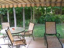 patio with landscape and furniture