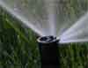 Pop up irrigation sprinkler