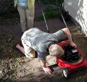 trying to fix the lawn mower safely?